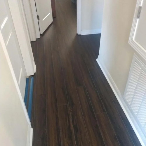 Luxury vinyl flooring installation by It Is Finished